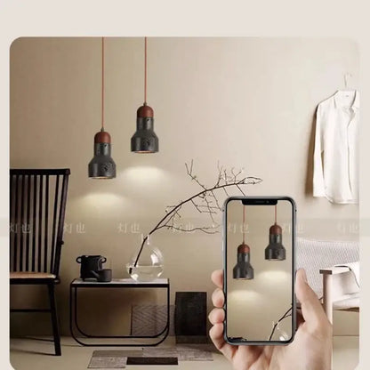 Decorbites black travertine led pendant lamp in black and copper with modern industrial design for dining room lighting