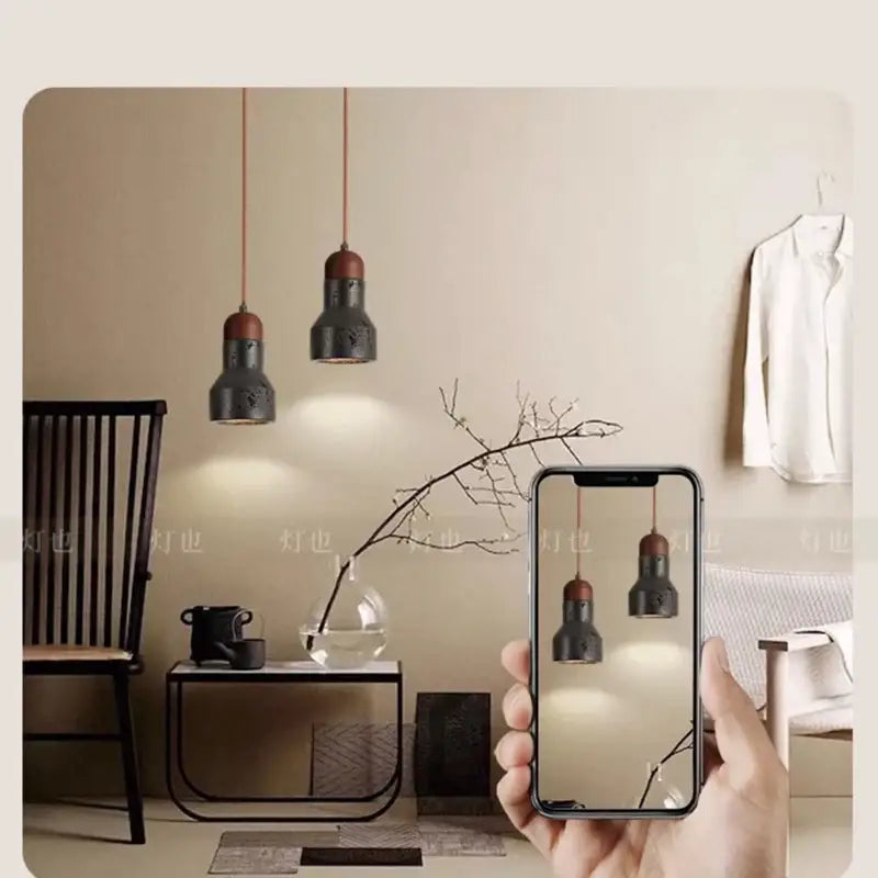 Decorbites black travertine led pendant lamp in black and copper with modern industrial design for dining room lighting