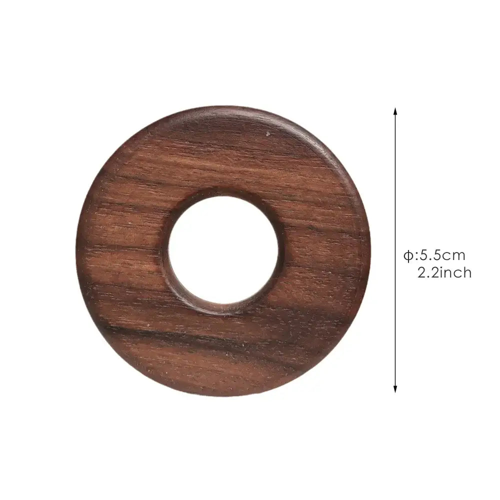Dark brown wooden decorbites black walnut donuts bag clips with smooth polished finish and visible grain patterns