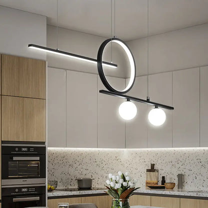 Modern black metal suspension light with circular ring and two spherical bulbs for dining room illumination