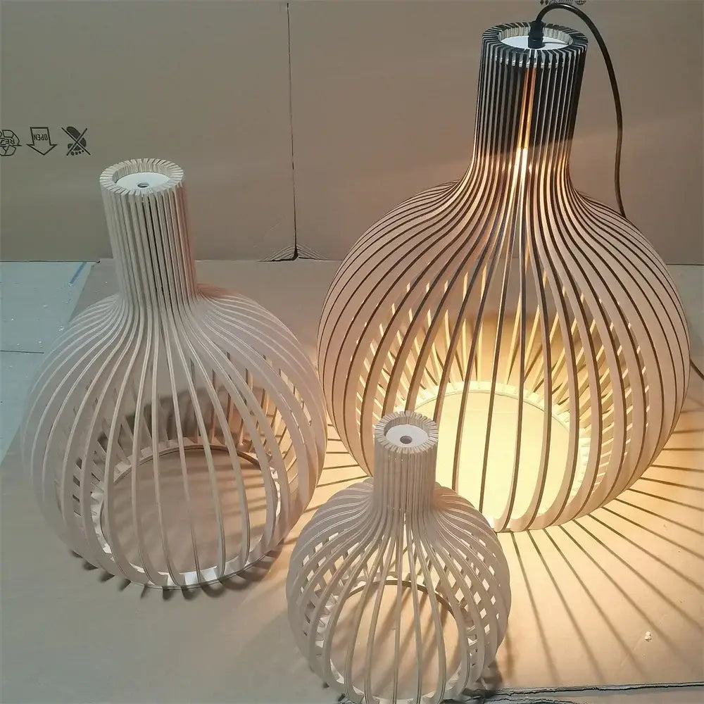 Three off-white wooden pendant lamps with ribbed spherical design for decorbites black wood cage chandelier lighting