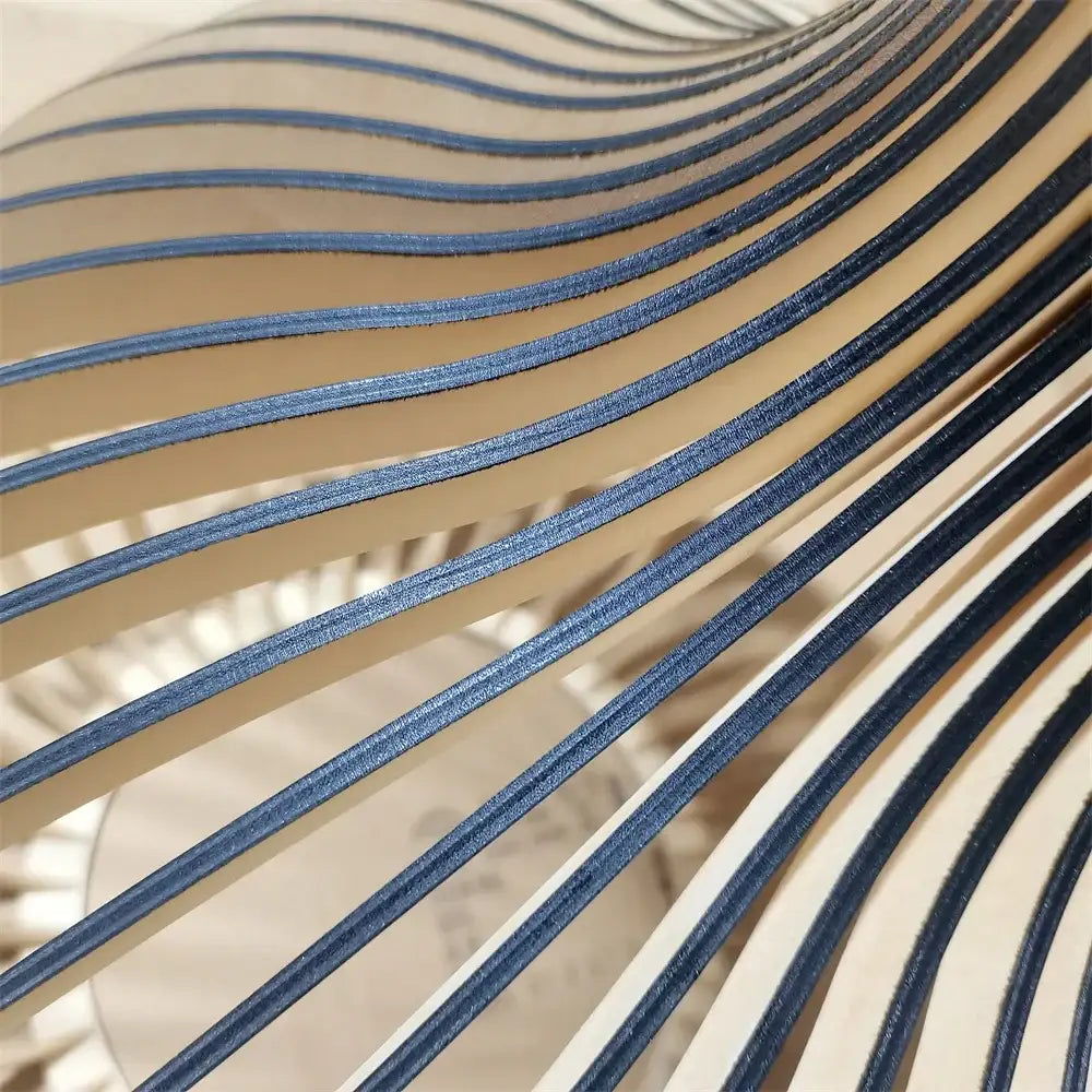 Blue and beige striped leather strips forming a wave pattern beside decorbites black wood cage chandelier spherical lamp