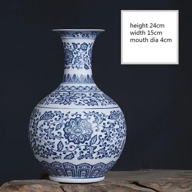 DecorBites™ blue and white ceramic vase with intricate floral patterns for elegant home decor and white ceramic vase collections