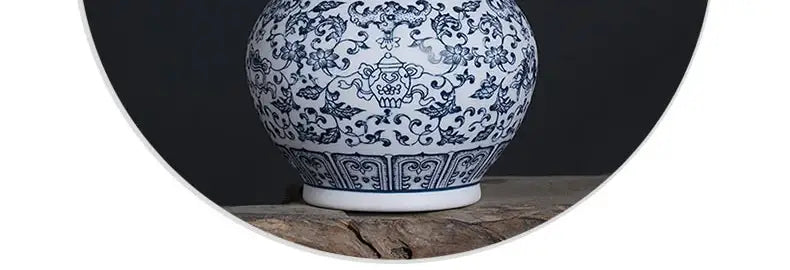 DecorBites™ blue and white ceramic vase with intricate floral and teapot motifs elegant home decor piece