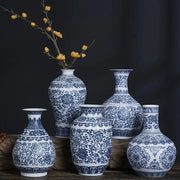 Decorbites™ blue and white ceramic vase with intricate floral patterns for elegant home decor and white ceramic vase options