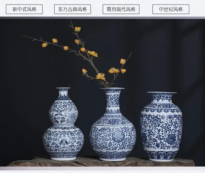 Three blue and white ceramic vases with intricate floral patterns perfect for elegant home decor by decorbites