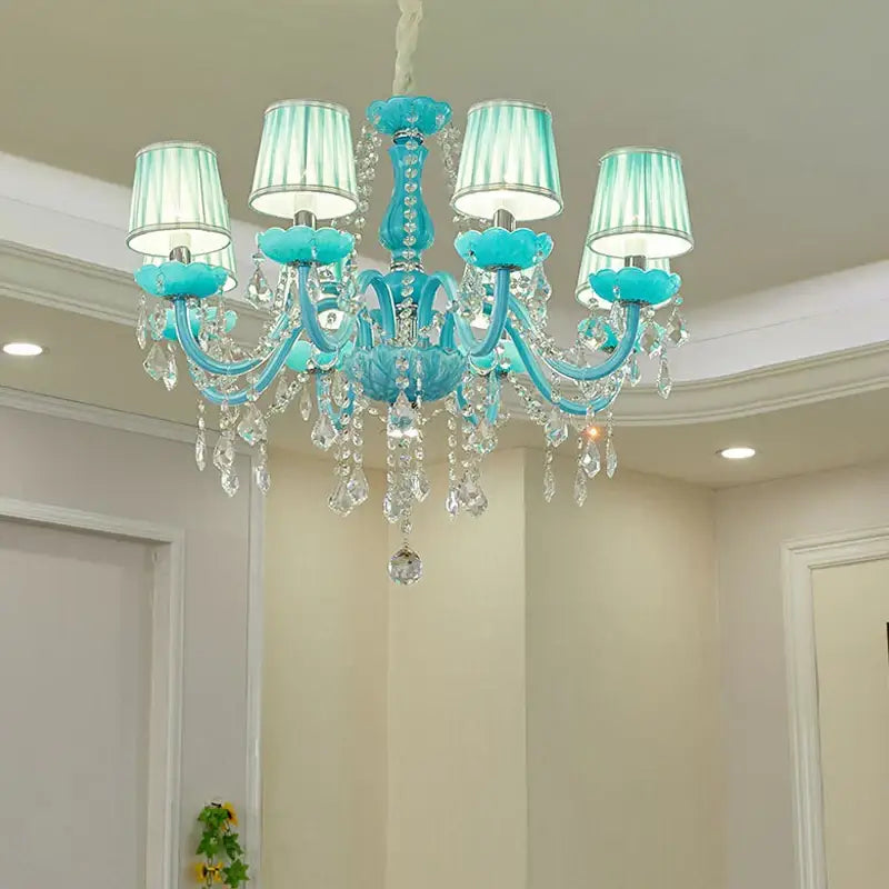 A decorbites blue crystal lamp candle chandelier with turquoise crystal, five lampshades, and clear glass ornaments