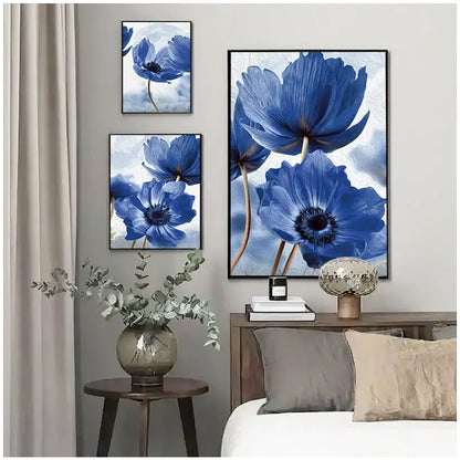 Set of three framed blue flowers wall art pieces with textured painterly surfaces in black frames for living room decor