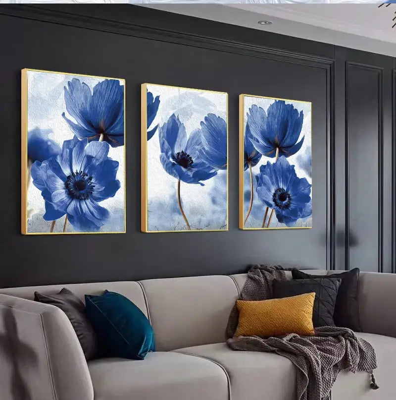 Three framed blue flowers artwork with gold frames by DecorBites for elegant living room wall decor