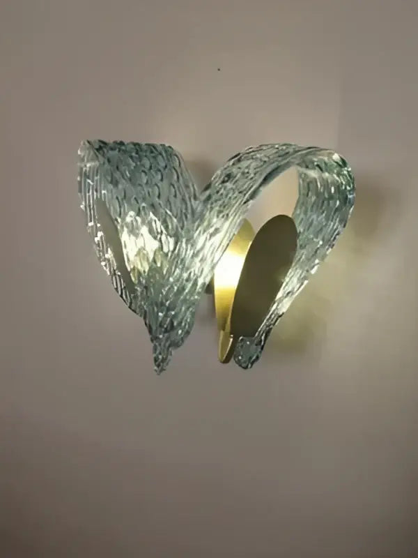 DecorBites™ blue glass led pendant lamps feature a sleek translucent blue glass sconce with warm gold center