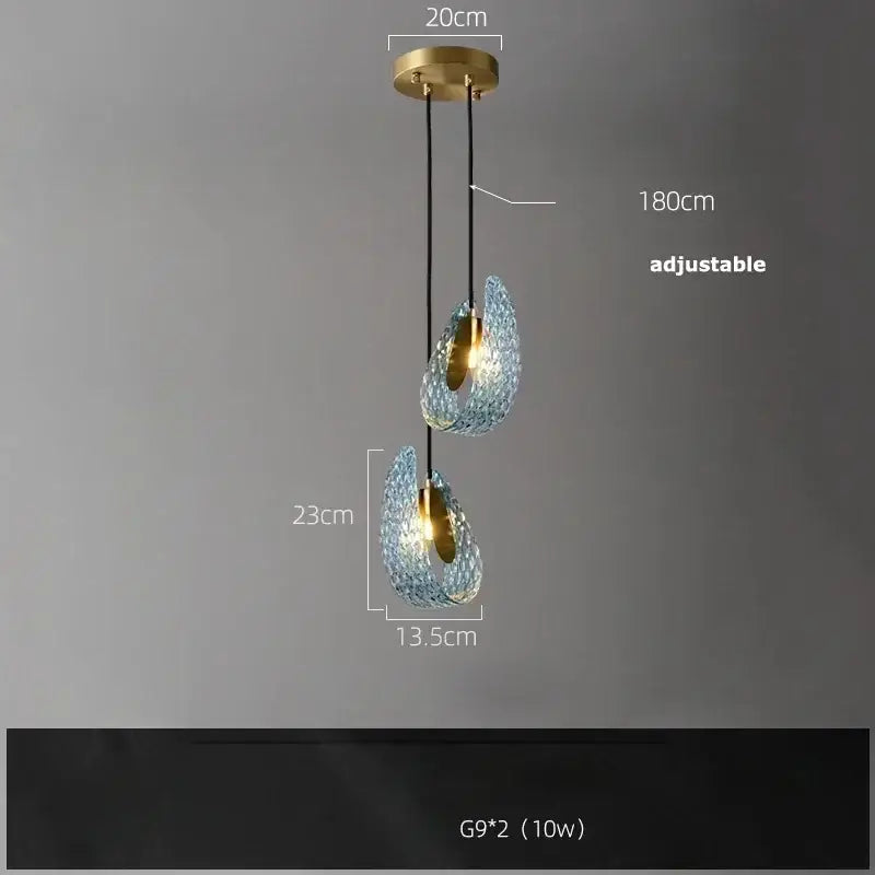 DecorBites™ blue glass led pendant lamps with adjustable brass accents and teardrop-shaped blue glass shades