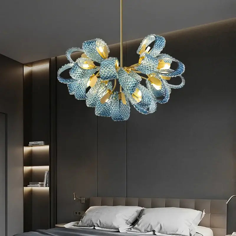 DecorBites blue glass LED pendant lamps featuring a modern blue glass chandelier with gold accents