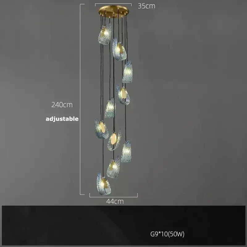 A modern DecorBites™ blue glass LED pendant lamp with brass finish and ten adjustable iridescent blue-green glass lights