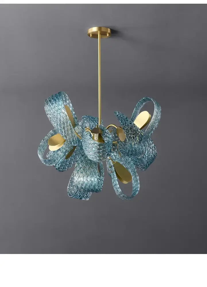 Blue glass led pendant lamps by decorbites featuring a modern sculptural design with gold accents
