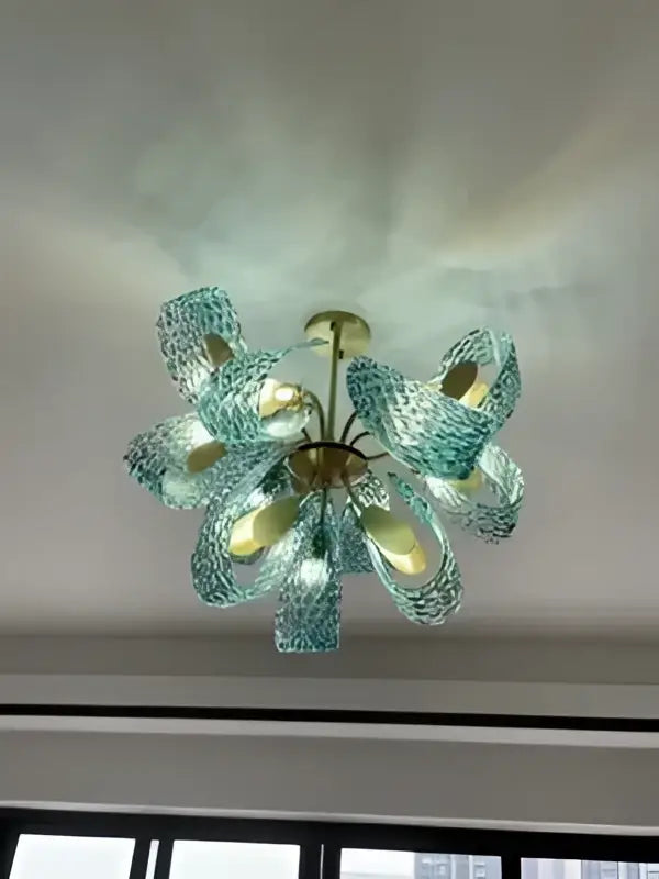 Decorbites™ blue glass led pendant lamps featuring a delicate turquoise glass chandelier with gold-toned structure