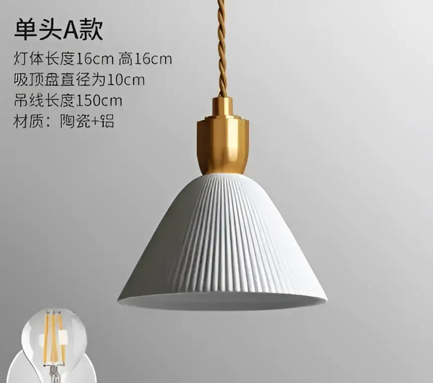 White ribbed ceramic pendant light with gold-toned fixture and twisted cord complementing decorbites blue glass pendant light