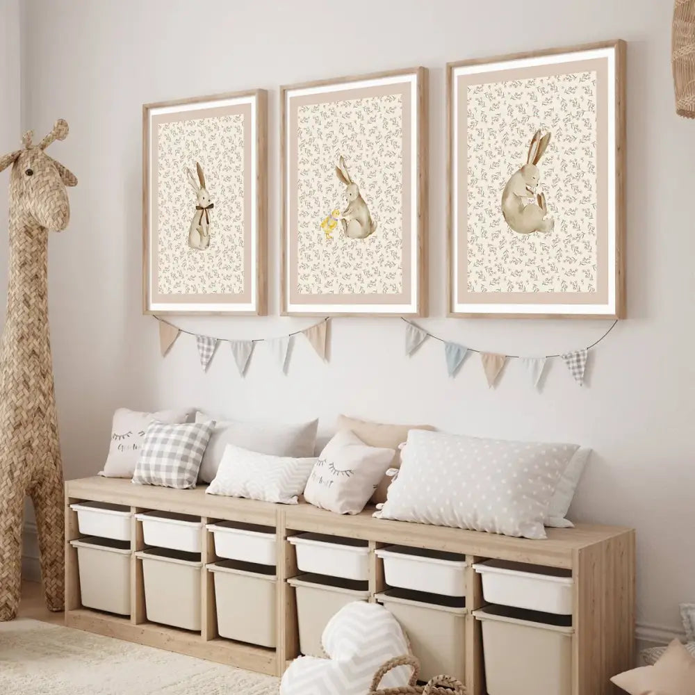 Three framed prints of watercolor-style rabbits in beige and cream tones in light wood with white matting wall art set bohemian style