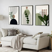 DecorBites™ bohemian green leaves wall art set of three minimalist botanical canvas pieces in earthy tones and black frames