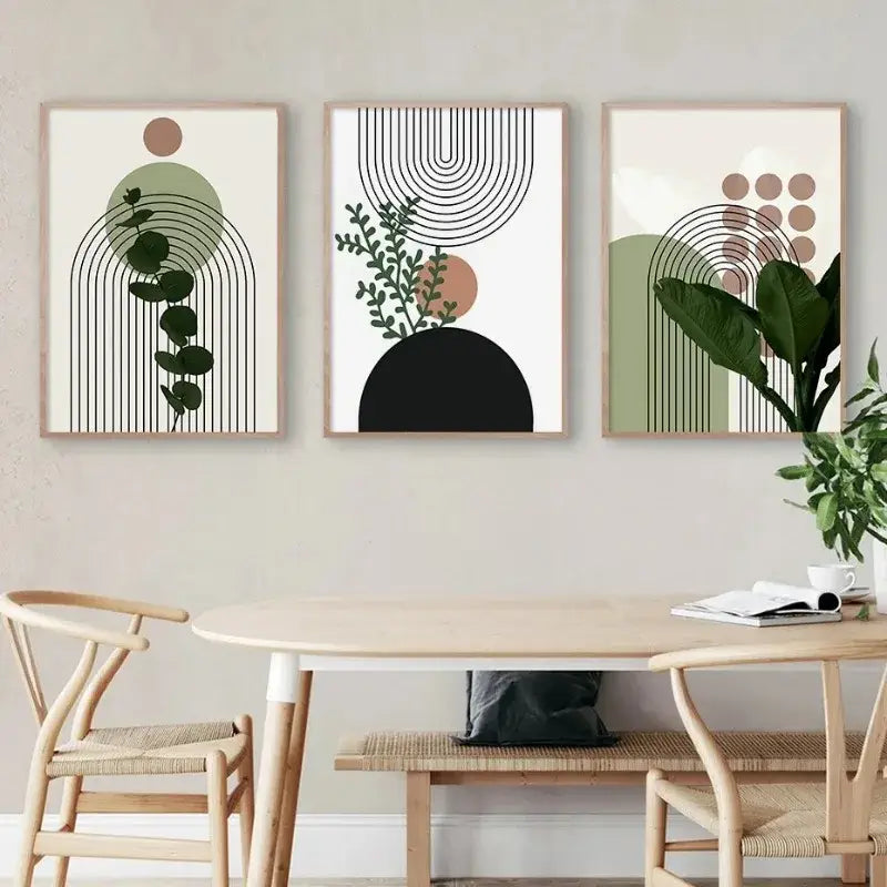 Three framed DecorBites™ bohemian light wall art pieces featuring green leaves and geometric designs in earthy tones