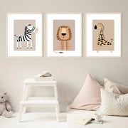 Set of three framed decorbites™ bohemian jungle animal toddler canvas prints featuring zebra lion and giraffe on beige background