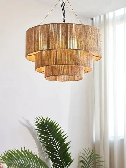 Decorbites bohemian rattan chandelier tiered bamboo dining room light with golden brown woven natural rattan texture and black chain suspension