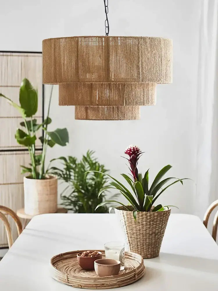 Decorbites bohemian rattan tiered chandelier in natural tones with layered cylindrical bamboo design for dining room lighting