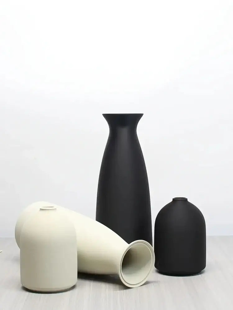 Black matte ceramic vase with slender neck and tapered body in decorbites™ bohemian style decorative vase set
