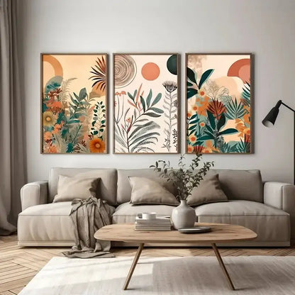 Set of three framed boho floral modern canvas art prints with vibrant orange green and earth-toned abstract motifs