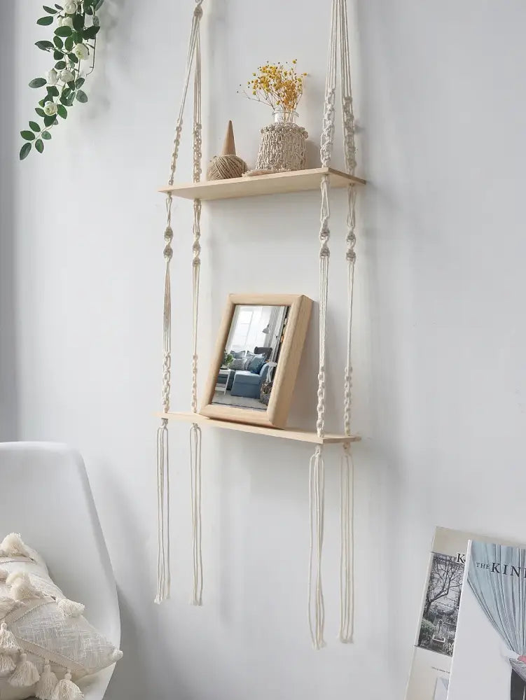 Beige boho macrame wall shelf with two wooden slats by DecorBites for stylish home decor and wall shelf use