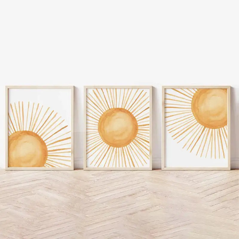 Three framed boho rainbow sunshine nursery posters with golden yellow centers and minimalist light wood frames