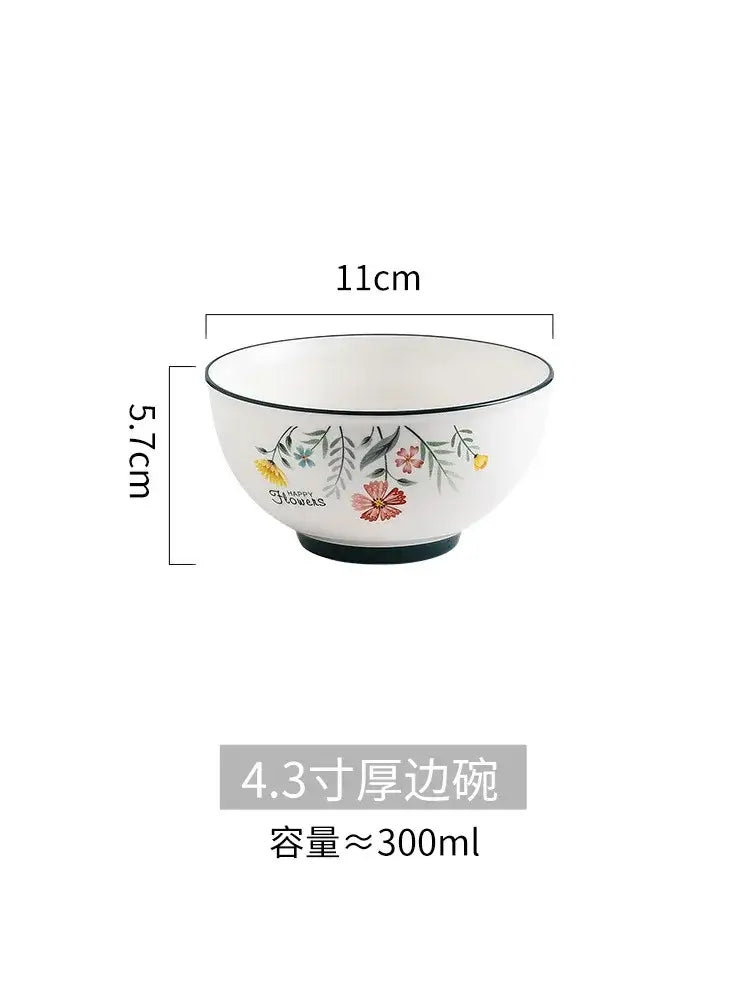 White ceramic rice noodles bowl from decorbites bone china set with delicate floral pattern and black trim accents