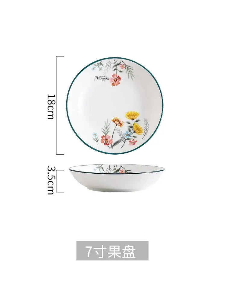 White ceramic rice noodles bowl with delicate pink floral pattern and teal rim from decorbites bone china set