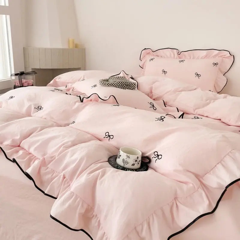 Decorbites™ bow embroidery bedding set with pink ruffled fabric black bow embroidery and contrasting black trim