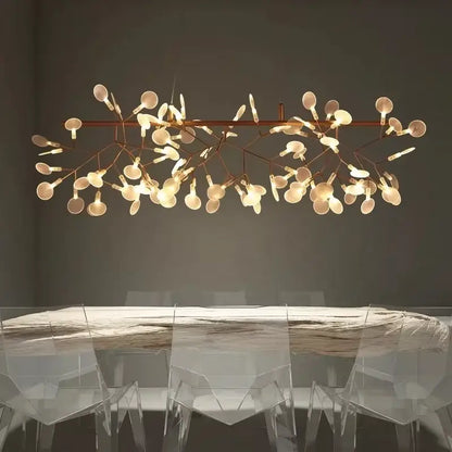 A modern decorbites™ branch design nordic chandelier with rose gold black metal frame and warm-toned bulbs