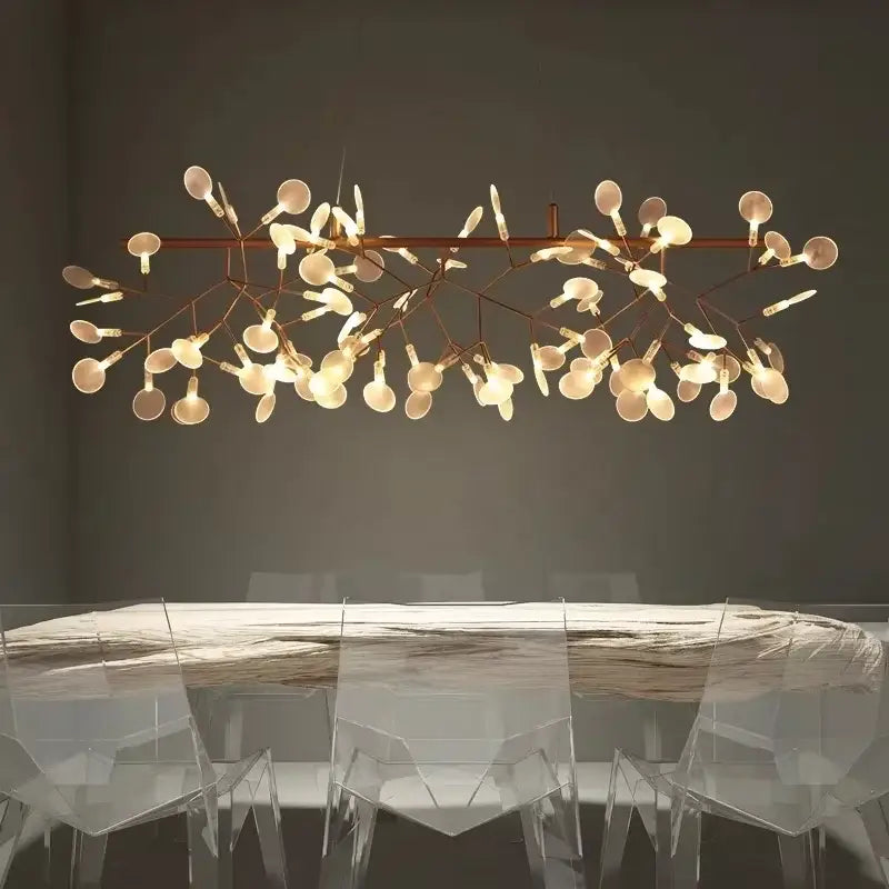 A modern decorbites™ branch design nordic chandelier with rose gold black metal frame and warm-toned bulbs