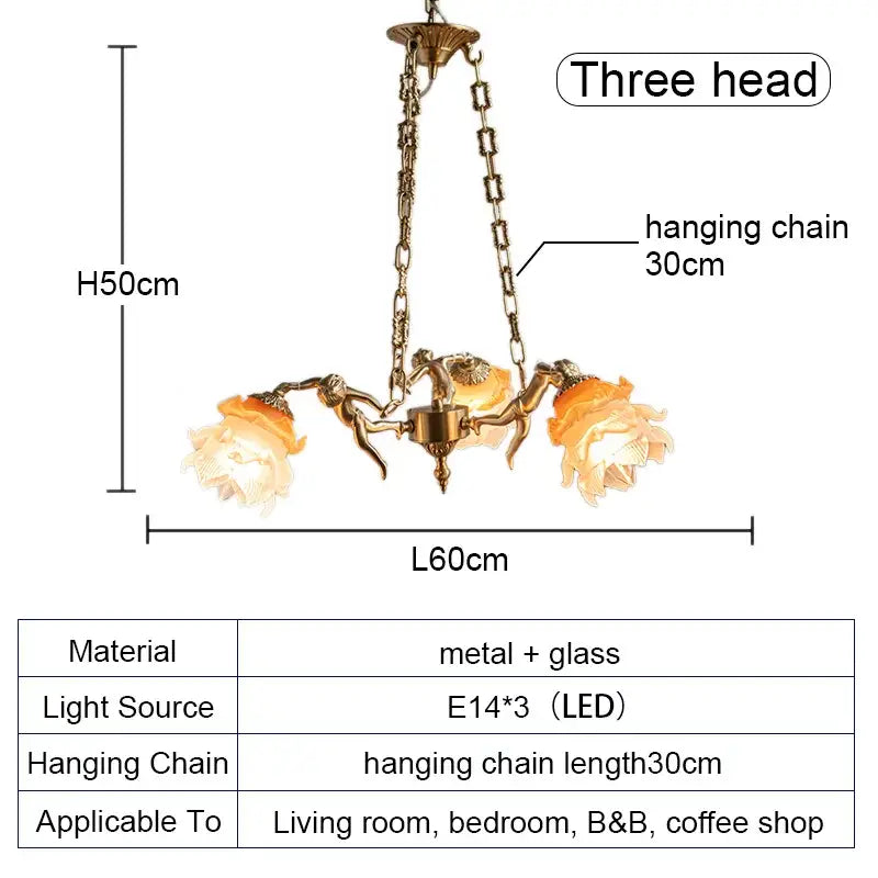 Antique brass-colored decorbites brass angel chandelier with ornate metal arms and amber flower glass for living room