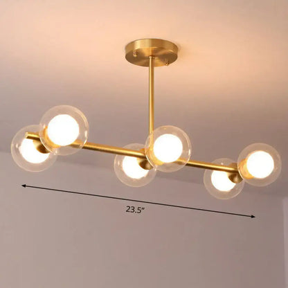 DecorBites brass finish 6-light linear island pendant with white clear glass ball shades and gold-toned fixture