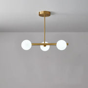 Modern brass DecorBites pendant ceiling light with three frosted glass globe bulbs for dining room lighting kit