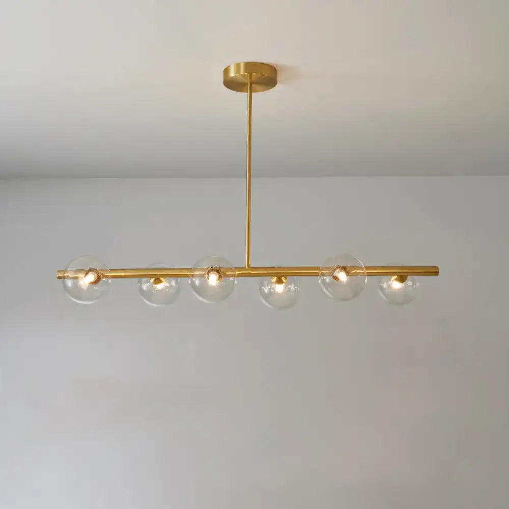 DecorBites brass island pendant ceiling light with five clear glass globes for modern dining room lighting