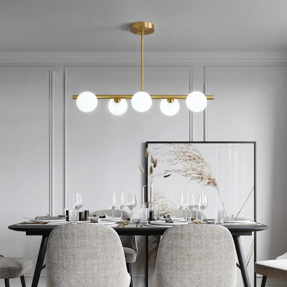 Decorbites brass island pendant light fixture with five frosted glass globes for dining room ceiling light