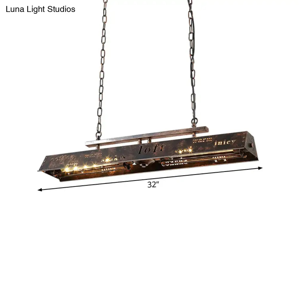 Industrial-style 32-inch brass island pendant light with dark metallic finish and vintage etched typography design