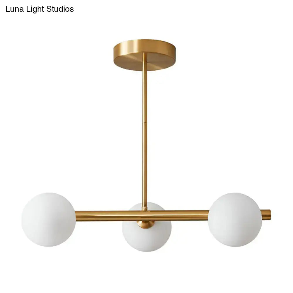 Decorbites brass plated modern hanging lighting with gold-toned glass sphere island pendant and clear white globe shades