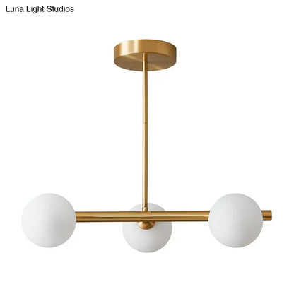 Decorbites brass plated modern hanging lighting with gold-toned glass sphere island pendant and clear white globe shades