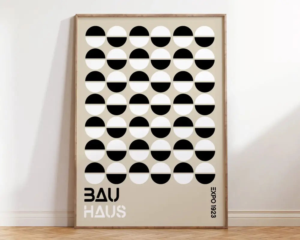 Minimalist bright geometric bauhaus canvas wall art with black and white half-circles on beige background by DecorBites™