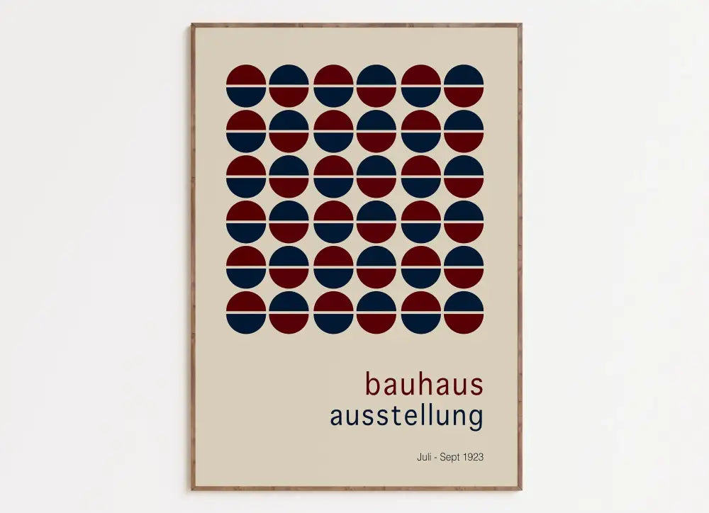 Beige bright geometric canvas print featuring red and navy blue halved circles in a light wood frame for home decor