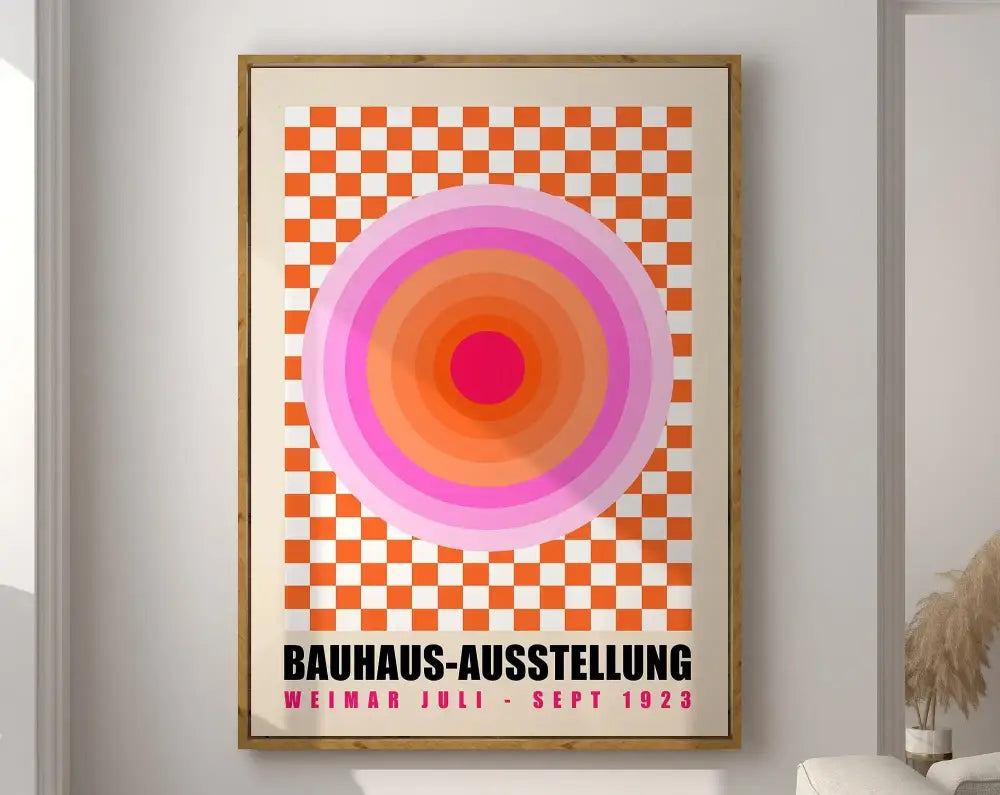 A framed bauhaus bright geometric canvas print with pink and orange circles on checkered background for home decor