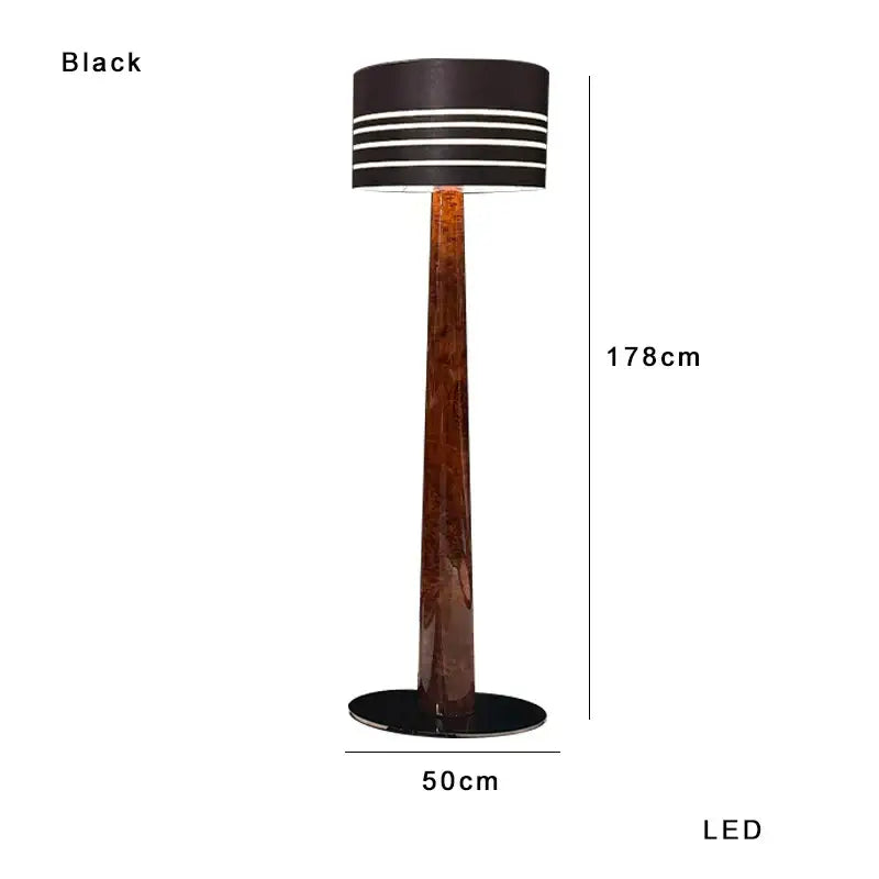Black led floor lamp with tall brown leather wooden marble base and cylindrical shade with white stripes by Decorbites