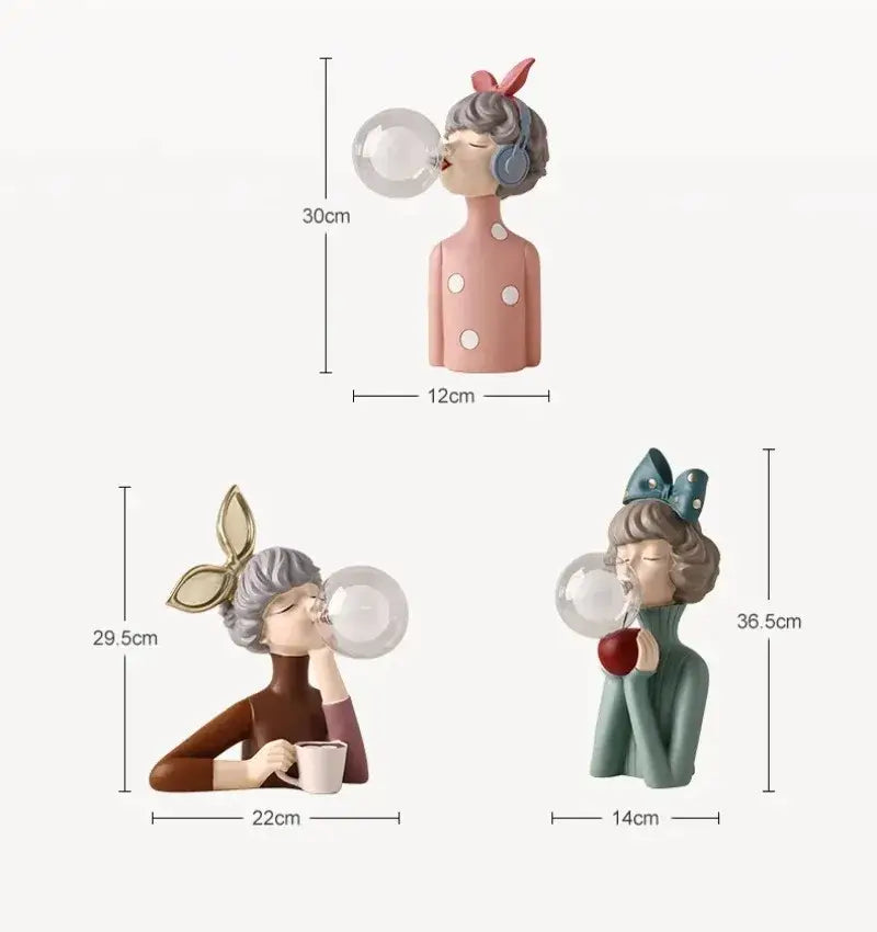 Pastel pink decorbites bubble girl resin figurine with gray hair and blue headphones blowing a clear bubble night light