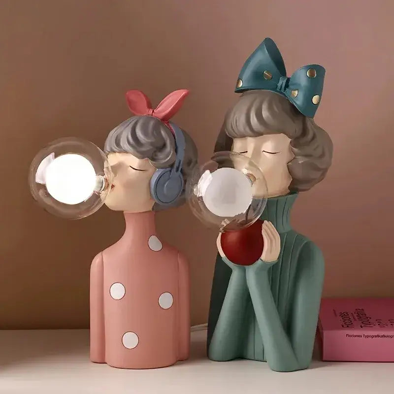 Pastel pink and teal decorbites bubble girl resin night light featuring stylized women with polka dots and glass globe lights