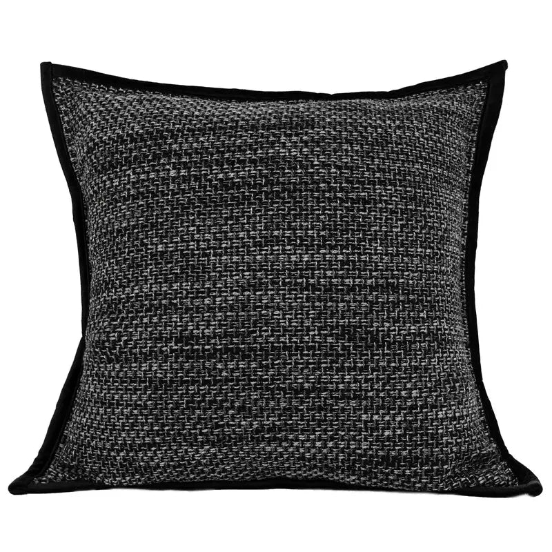 Black and gray tweed throw pillow with contrasting black velvet trim complementing decorbites burgundy velvet geometric embroidered bed runner